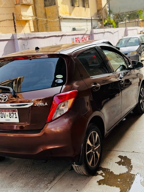 Toyota Vitz 2012/2016 JEWELA BROWN INTERIOR GOOD CONDITION ALL CLEAR 1