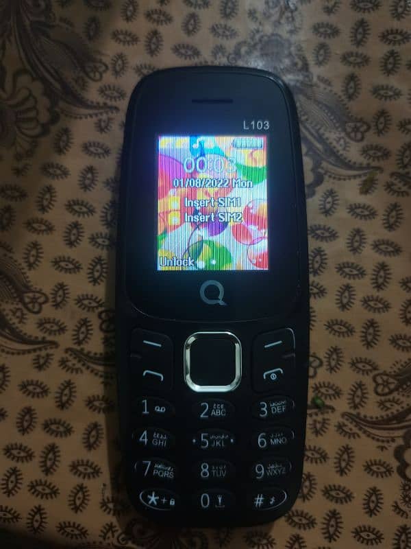 Q Mobile model L103 1