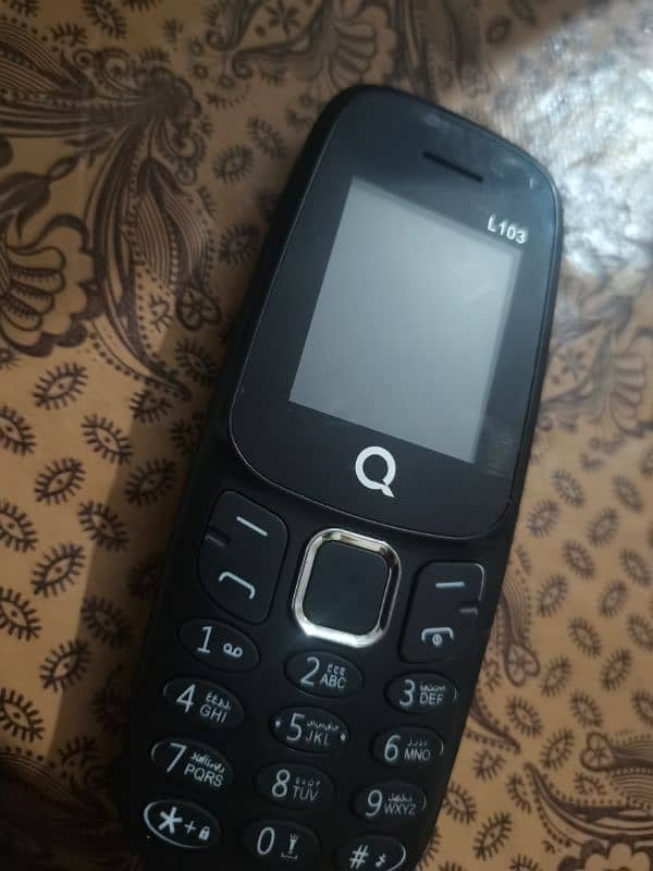 Q Mobile model L103 3