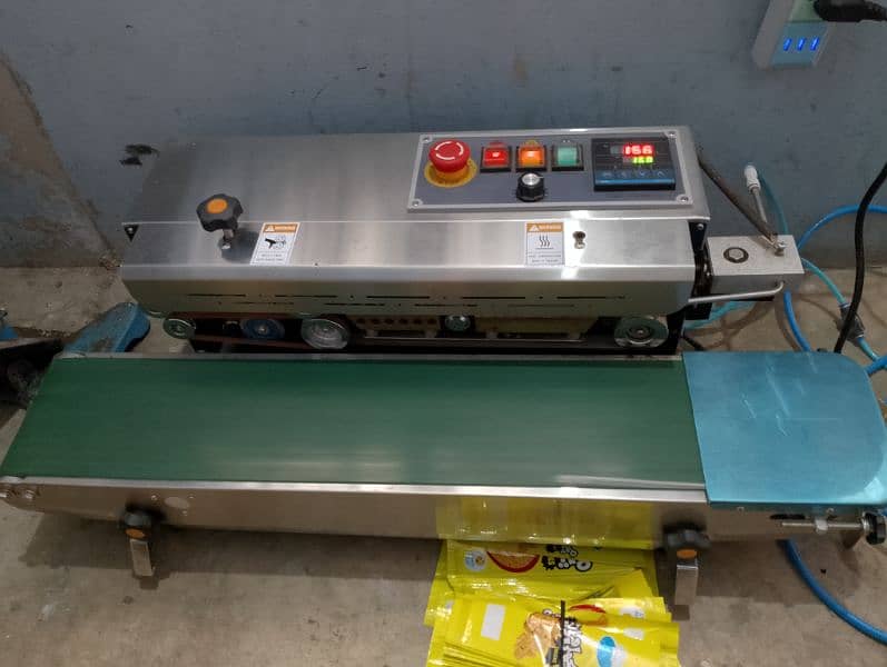 continue band sealer with compressor and pandal machine 1