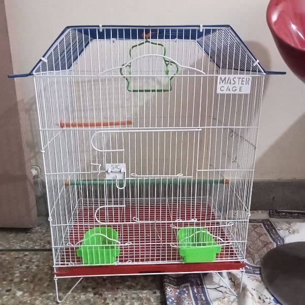 Used cage for parrot 0