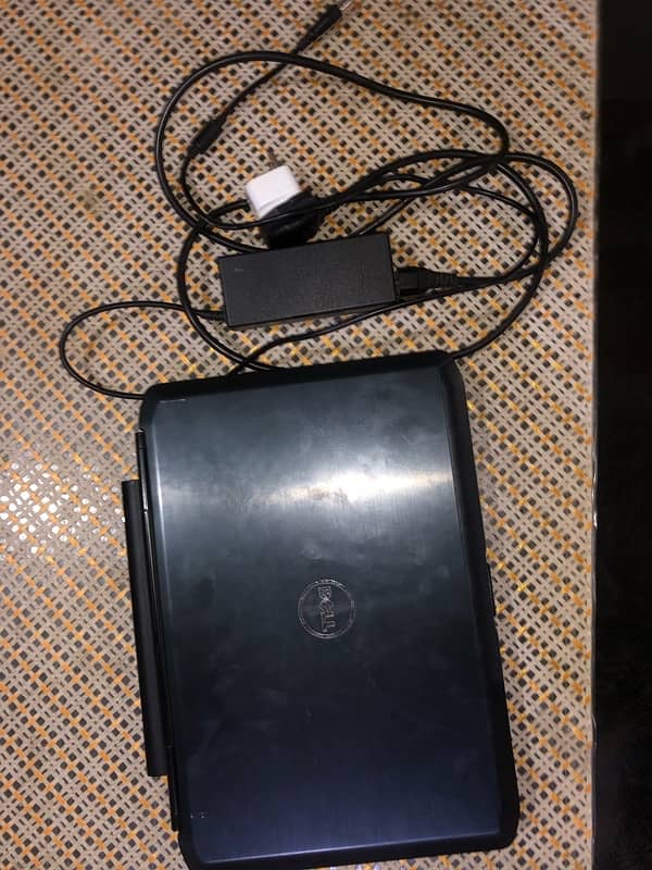 Dell laptop with smooth touchpad and fast charger, x64-based processor 3