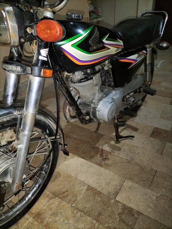 HONDA 125 2016 black Rahim yar Khan num 7