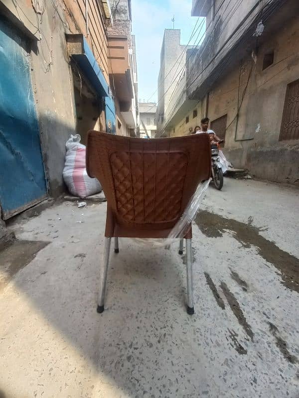 4 plastic chairs with one folding table set 1