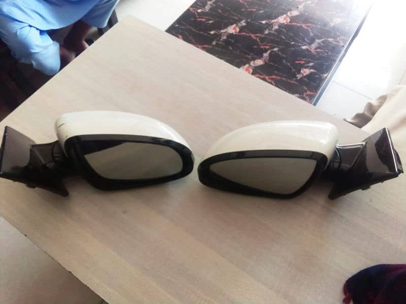 kia Sportage genioun sied mirror. . . 2