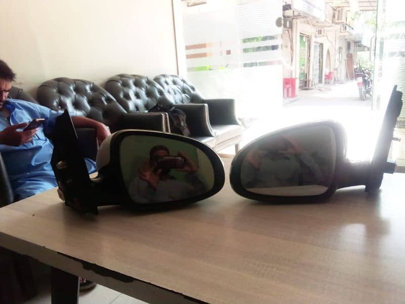 kia Sportage genioun sied mirror. . . 5