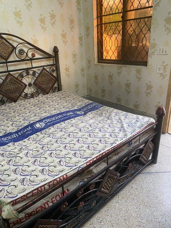 king size iron bed just like new. 1