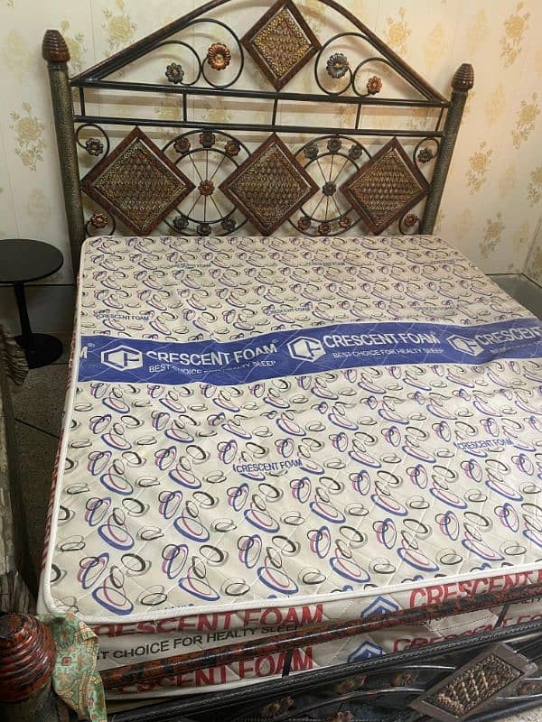 king size iron bed just like new. 2