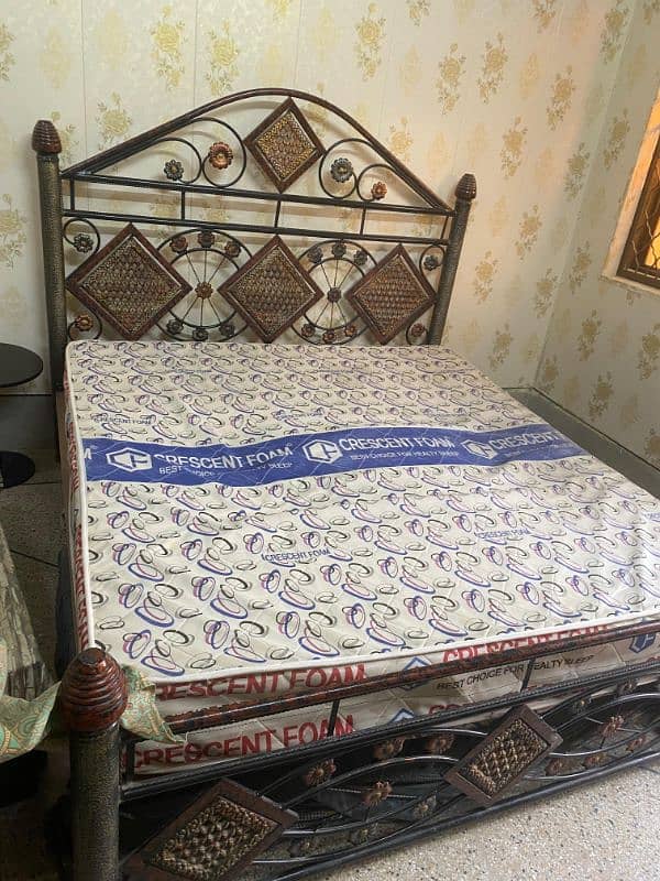 king size iron bed just like new. 4