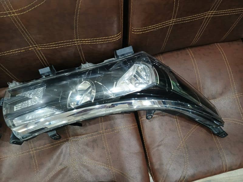 bumper 2016 model corolla and Head light 1