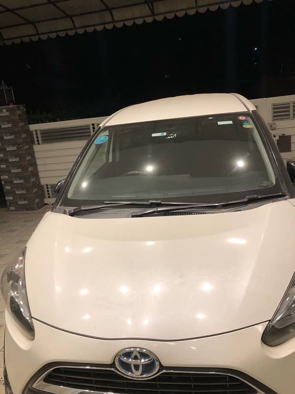 Toyota Sienta 2015 good condition with black interior 7 seater 11