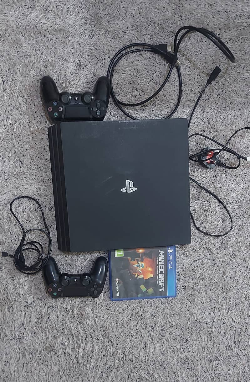 PS4 Pro 1 TB with original controller & mine craft CD 1