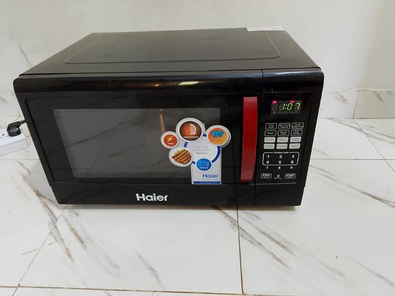 Haier microwave oven 2 in 1 grill microwave oven jumbo size 45 liter 0