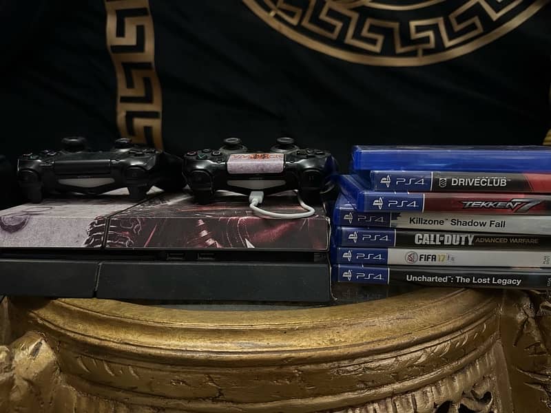 Ps4 + 7 games + 2 controllers 0