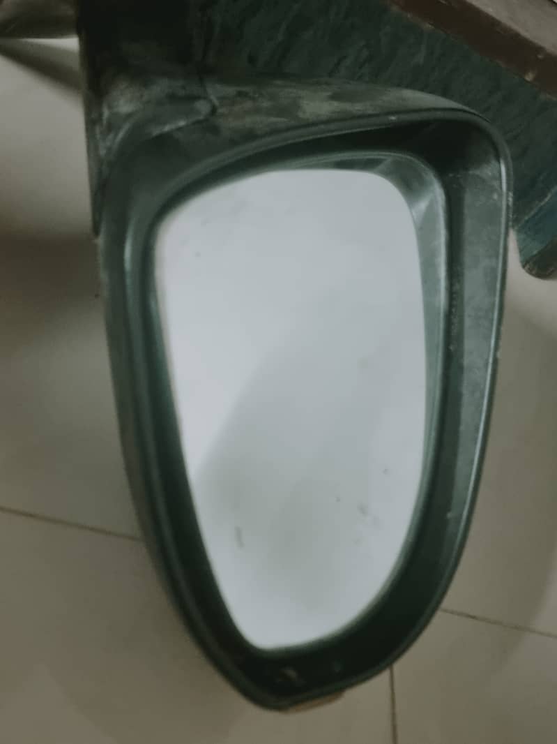 vitz jewalla kai side mirror hai achi condition mai hai100 original 6