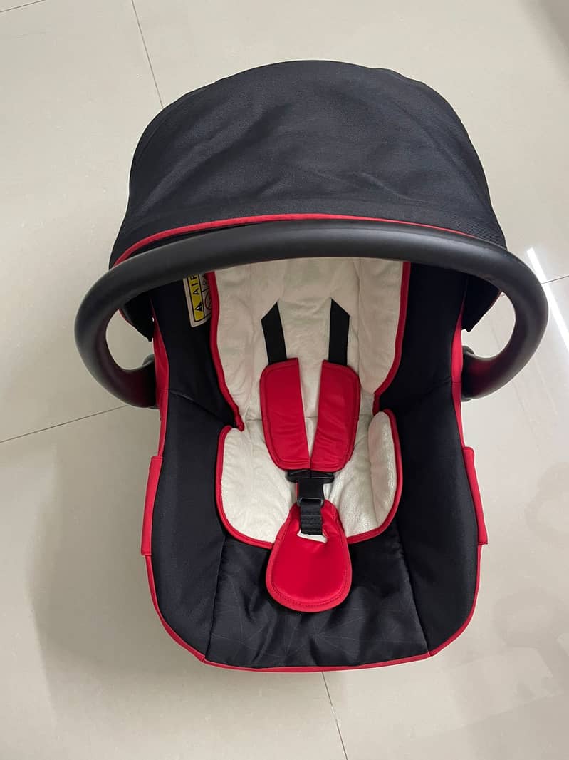 Tinnies 2 in 1 carry cot plus car seat 1