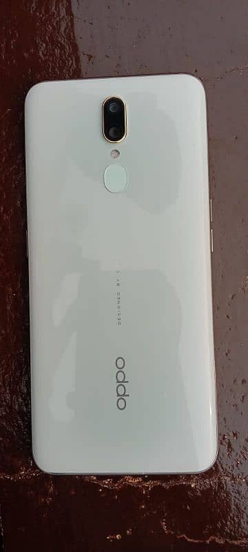 oppo f11 8 gb ram. 256gb mamory condition 10 by 10 with chargerl 7