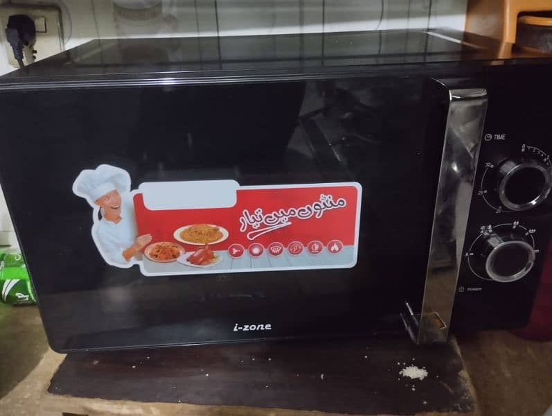 i zone microwave oven for sale only one month use new Condition 2