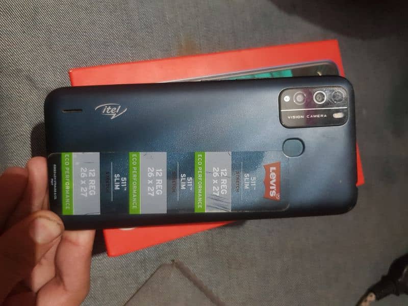 Itel Version 1 pro with box and charger 4