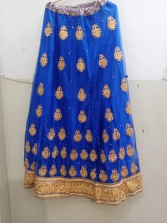 Royal blue shararah with a sea green dupatta