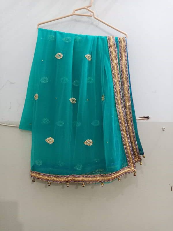 Royal blue shararah with a sea green dupatta 8