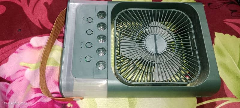 electric charge mini fan , good condition 0