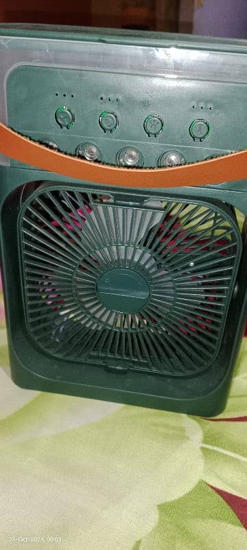 electric charge mini fan , good condition 1