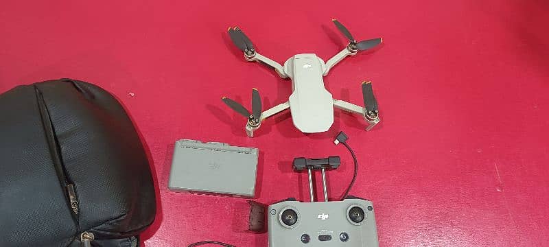 Dji mini 2 camera for sale with all accessri 3 battery 0