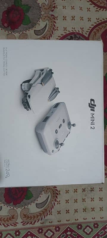 Dji mini 2 camera for sale with all accessri 3 battery 5