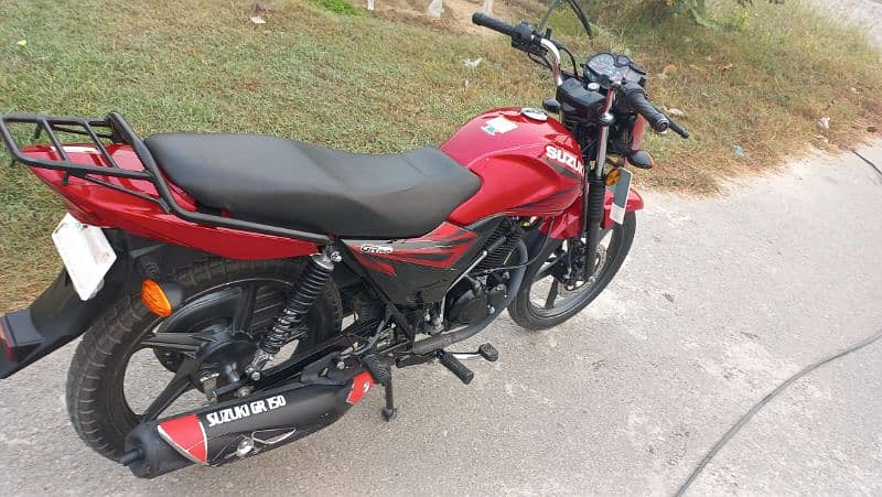 Suzuki GR 150  red colour  self start   disc break  registration all 3