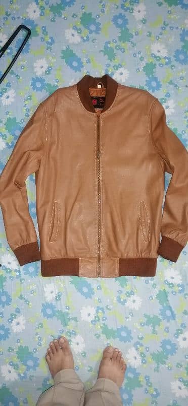 I'm selling sheep leather bomber jacket slightly use made in Pakistan. 3