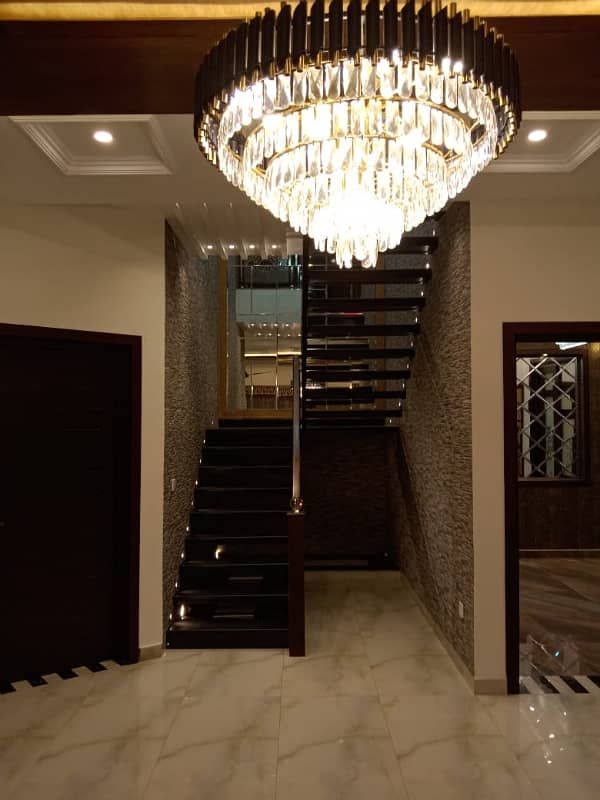 Brand New Ten Marla Beautiful modern house at prime location with 10 KV solar and Green meter, near Mousqe, Park, and Market in Overseas B block Bahria Town Lahore 13