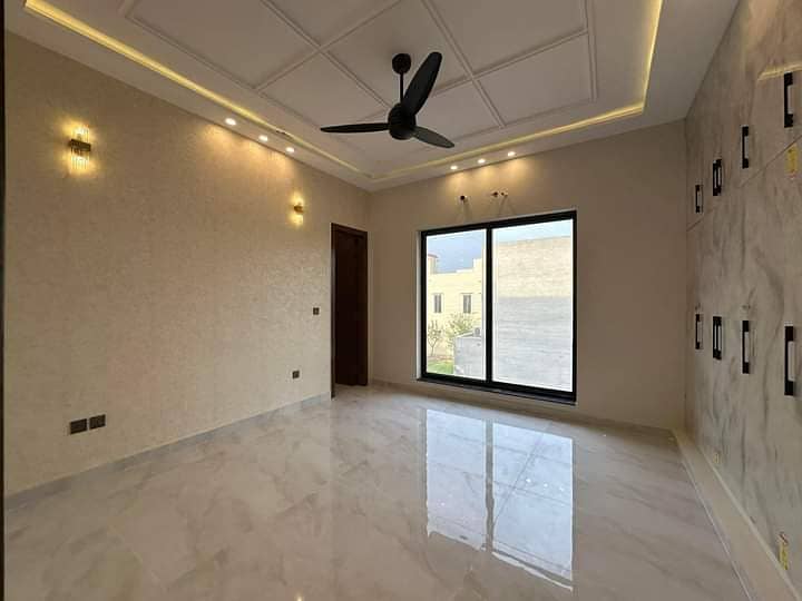 Brand new Ten Marla luxurious House with solid construction and beautiful modern elevation at prime location near Mousqe, Park, Market and Petroleum station available in Rafi block Bahria Town Lahore 12