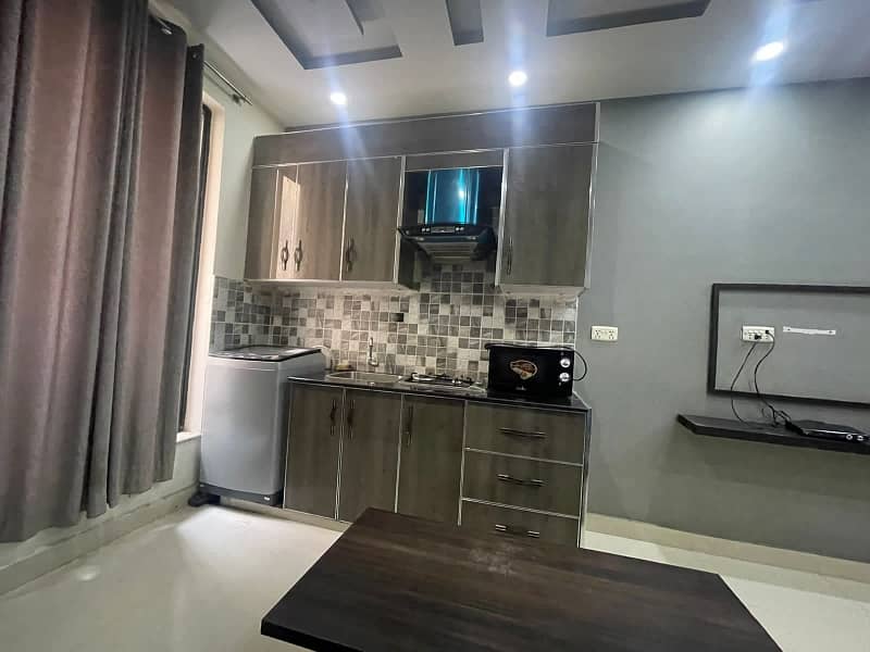 One bed beautiful fully furnished apartment for rent near the Grand Mosque in Secter C Bahria Town Lahore 5