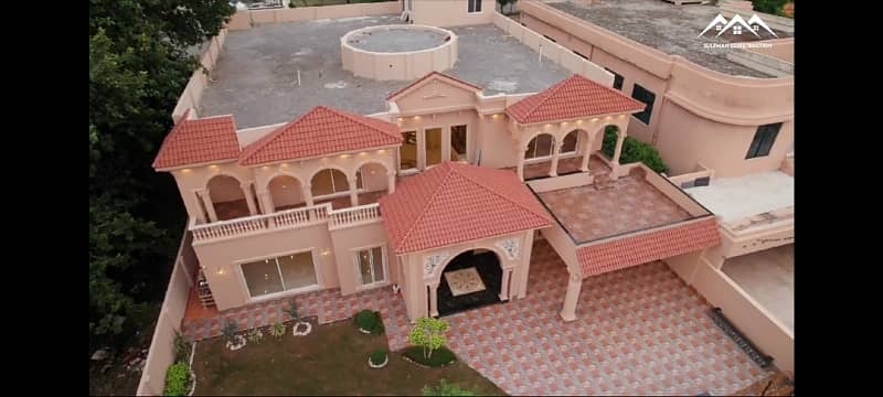 Two kanal luxury designer house for sale at main boulevard of Secter D Bahria Town Lahore Pakistan 1