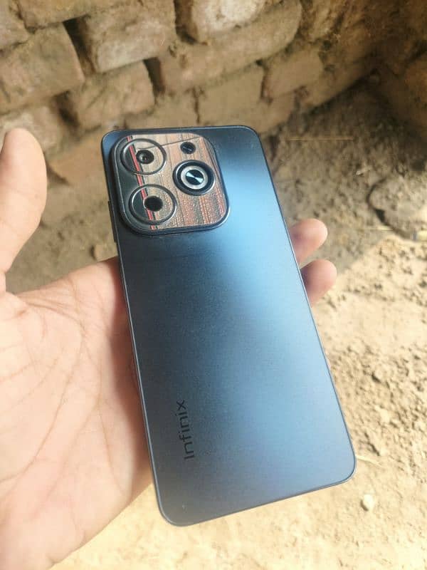 infinix hot40i lush condition with inbox or 6 month waranty 0