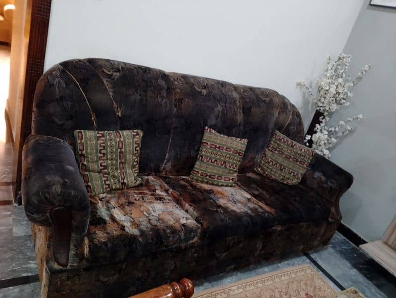 5 seat heavy wooden sofa in good condition 1