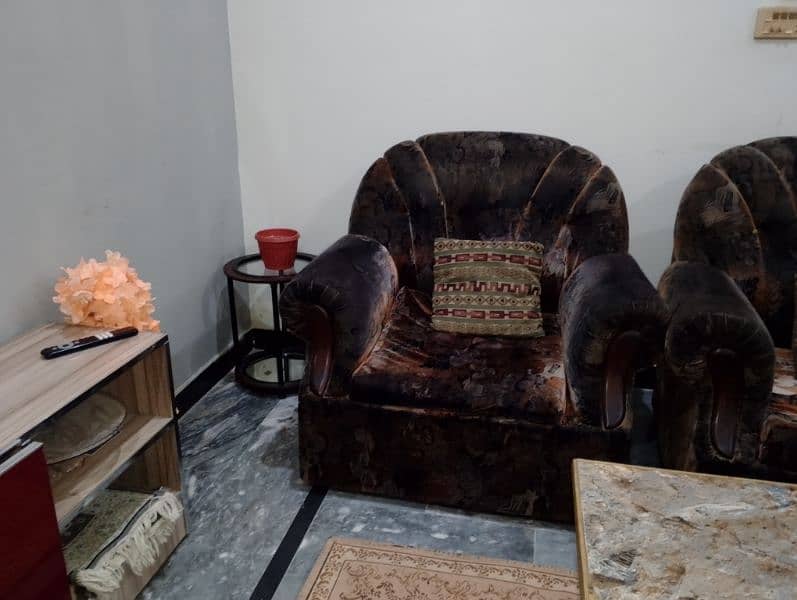 5 seat heavy wooden sofa in good condition 3