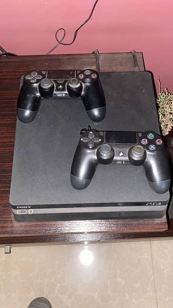 PlayStation 4 (Ps4) Slim 500GB With Two Controllers 1