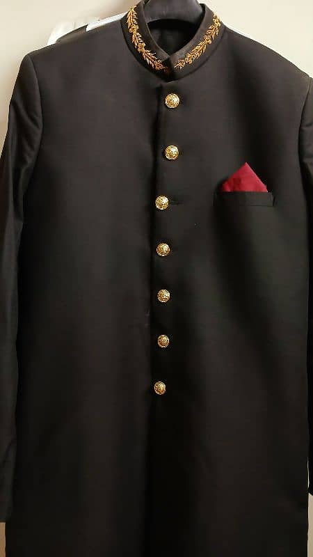 Men black sherwani only. 1