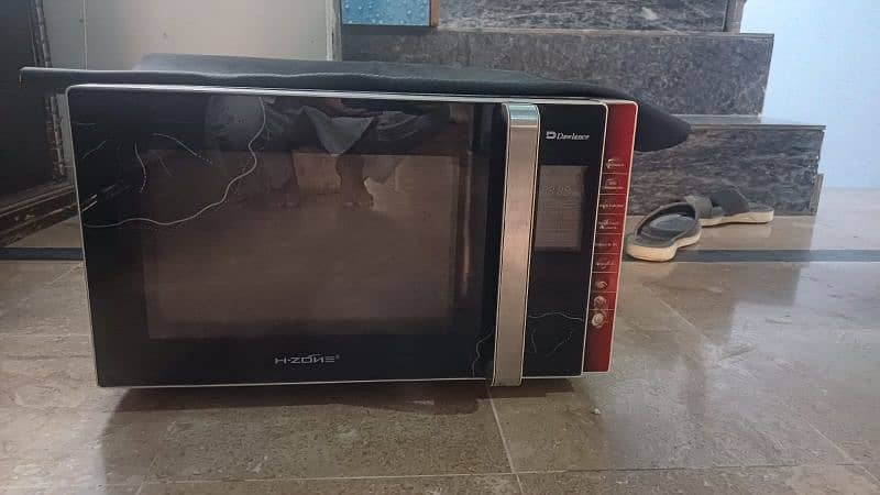 25 liter Dawlance microwave available for sale. 03289652709 0