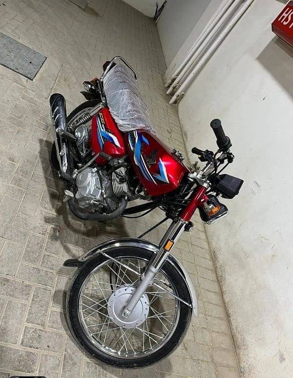 Honda cg 125 2024 zero meter condition first owner karachi number 1