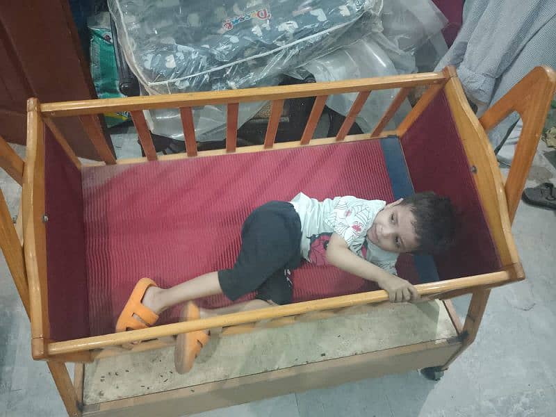 wooden baby cradle for sale in good condition 2