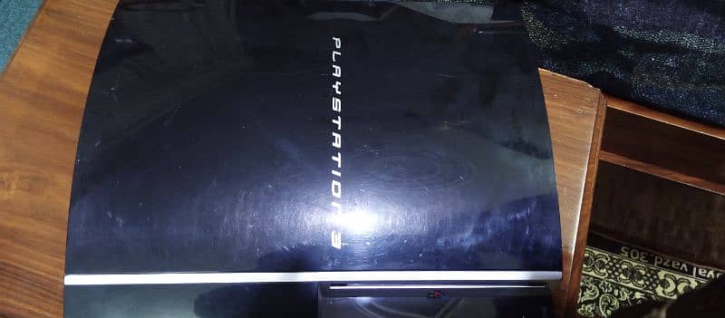 used playstation 3 with games . cables and 2 controllars 0