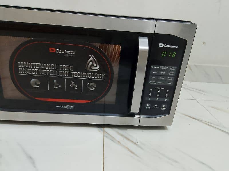 Dawlance 2 in 1 grill microwave oven jumbo size 3 day  warranty check 0