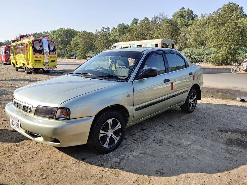 Suzuki baleno jxr 2001 good condition own power full ingine ac chilled 4