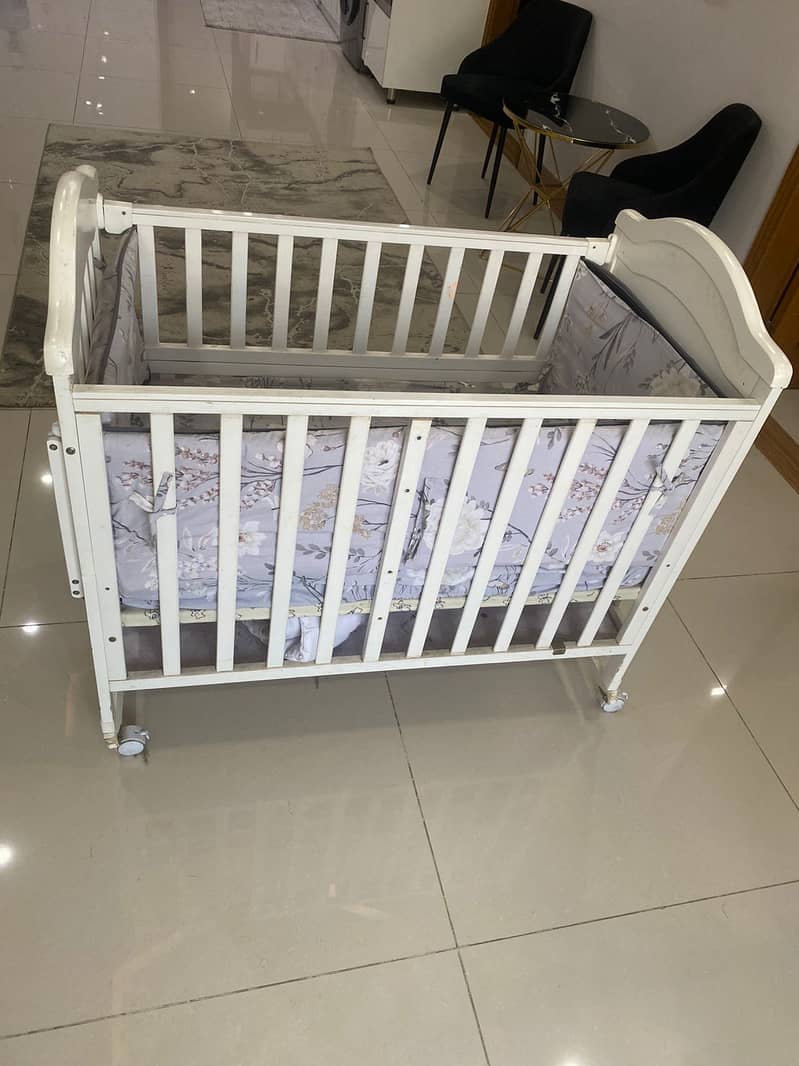 Tinneys Branded Baby Cot/ swinger. 1