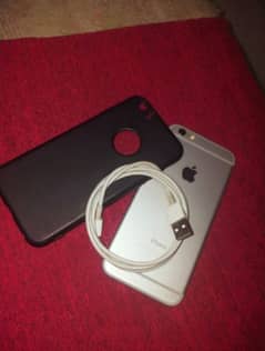 IPHONE 6 IN SILVER COLOR WITH BLACK COVER AND IPHONE LEAD