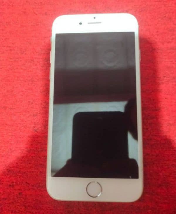 IPHONE 6 IN SILVER COLOR WITH BLACK COVER AND IPHONE LEAD 4