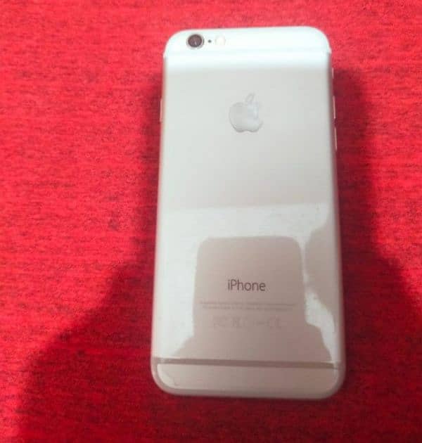 IPHONE 6 IN SILVER COLOR WITH BLACK COVER AND IPHONE LEAD 5